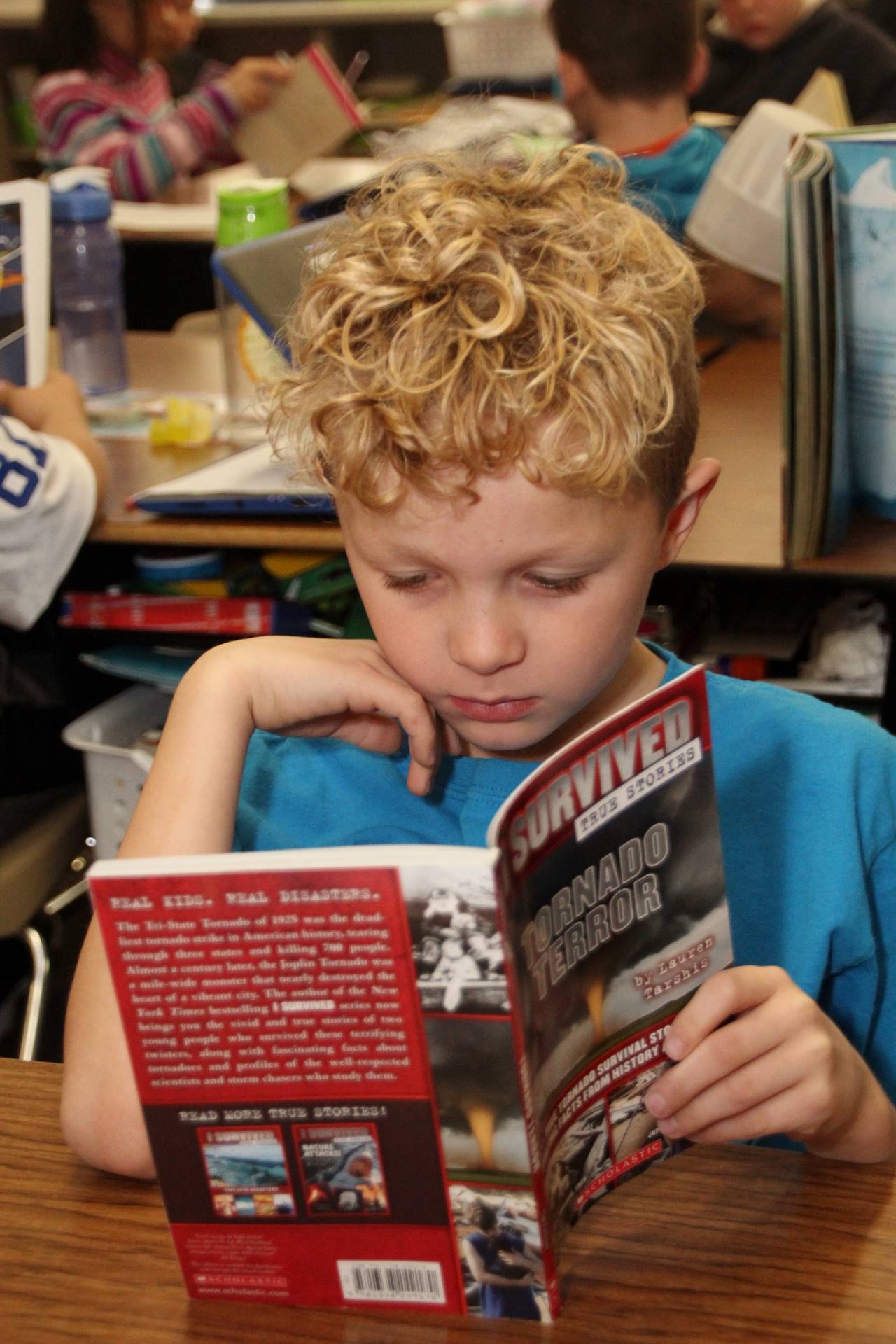 student reading book